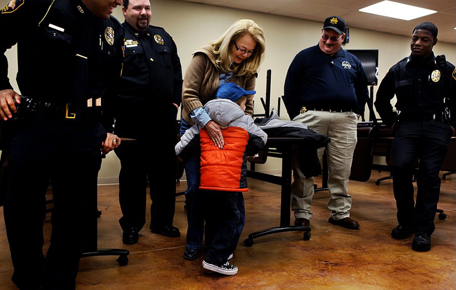 Lil D thanking all the officers for the day and his car.